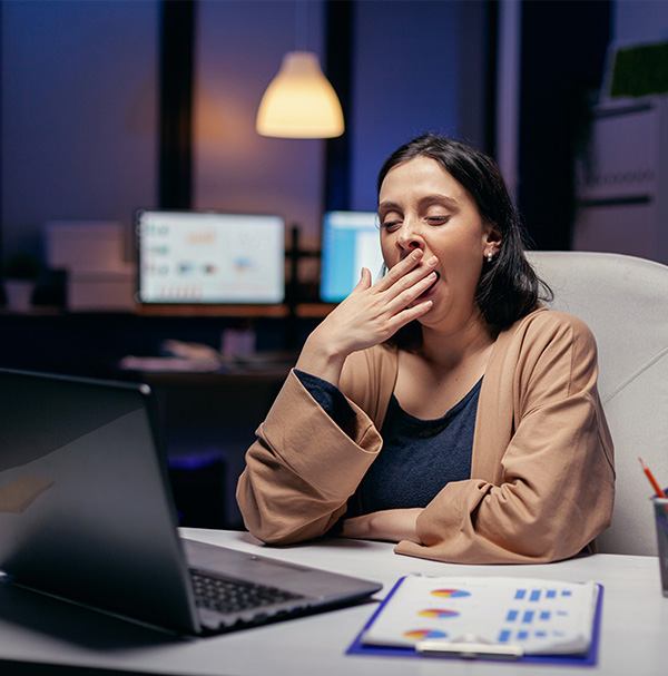 Young Professional suffering from Lethargy at Work
